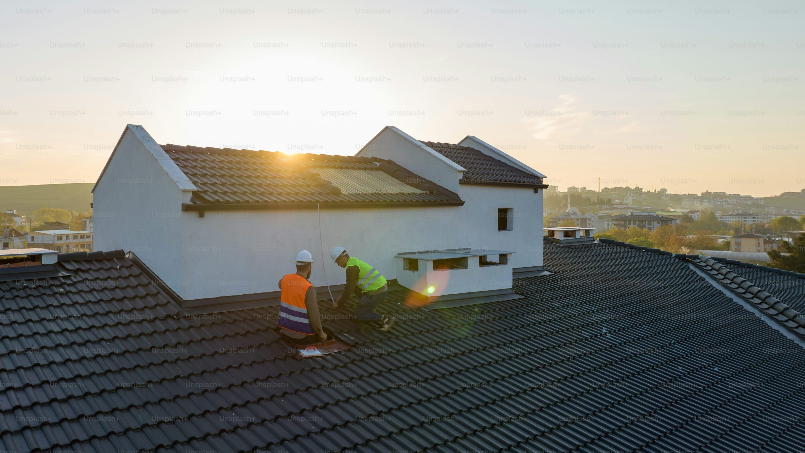 Roofing Brandon Boys team working on a roof